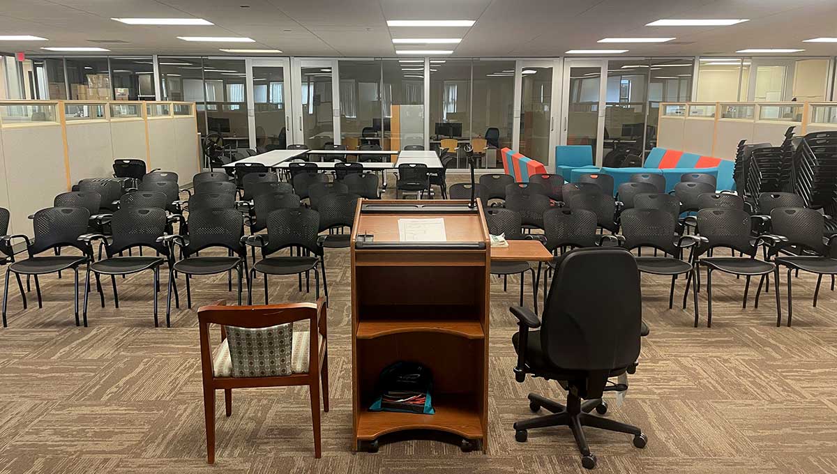 view of open seating area with podium